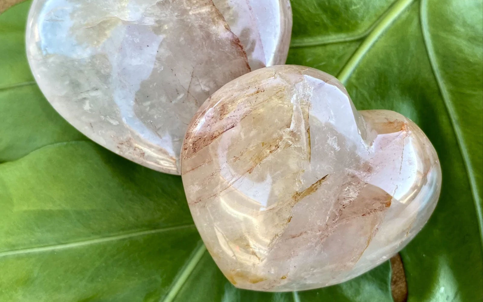 Heart stones on leaf