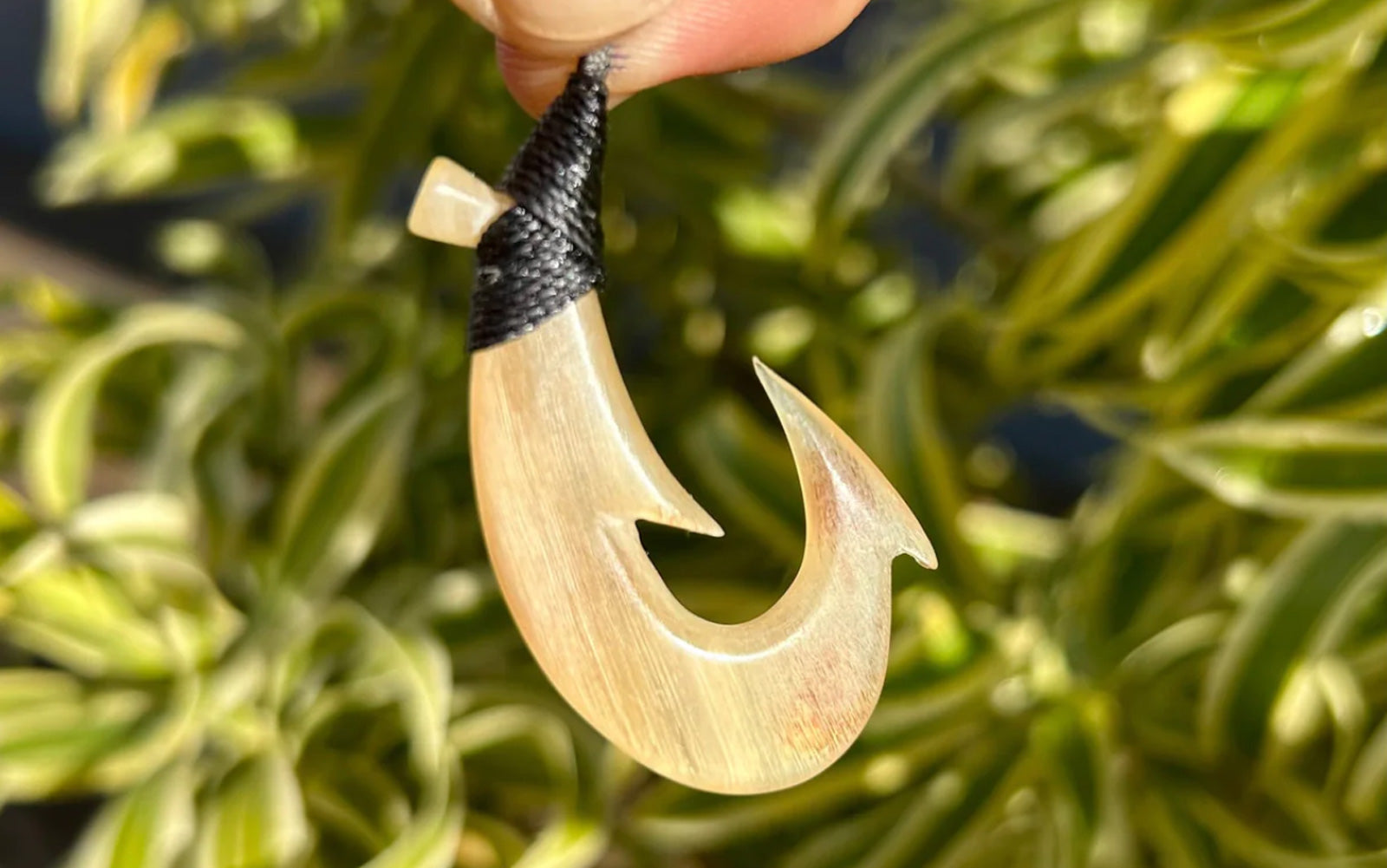 Maui Fish Hook pendant on black cord necklace