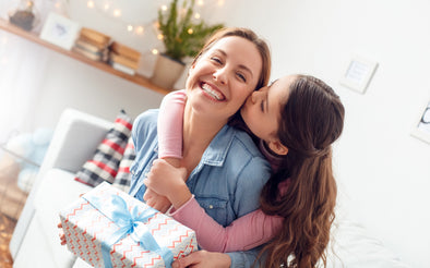 Daughter gifts mom a Mother's Day gift