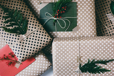 christmas gifts in polka dot brown paper