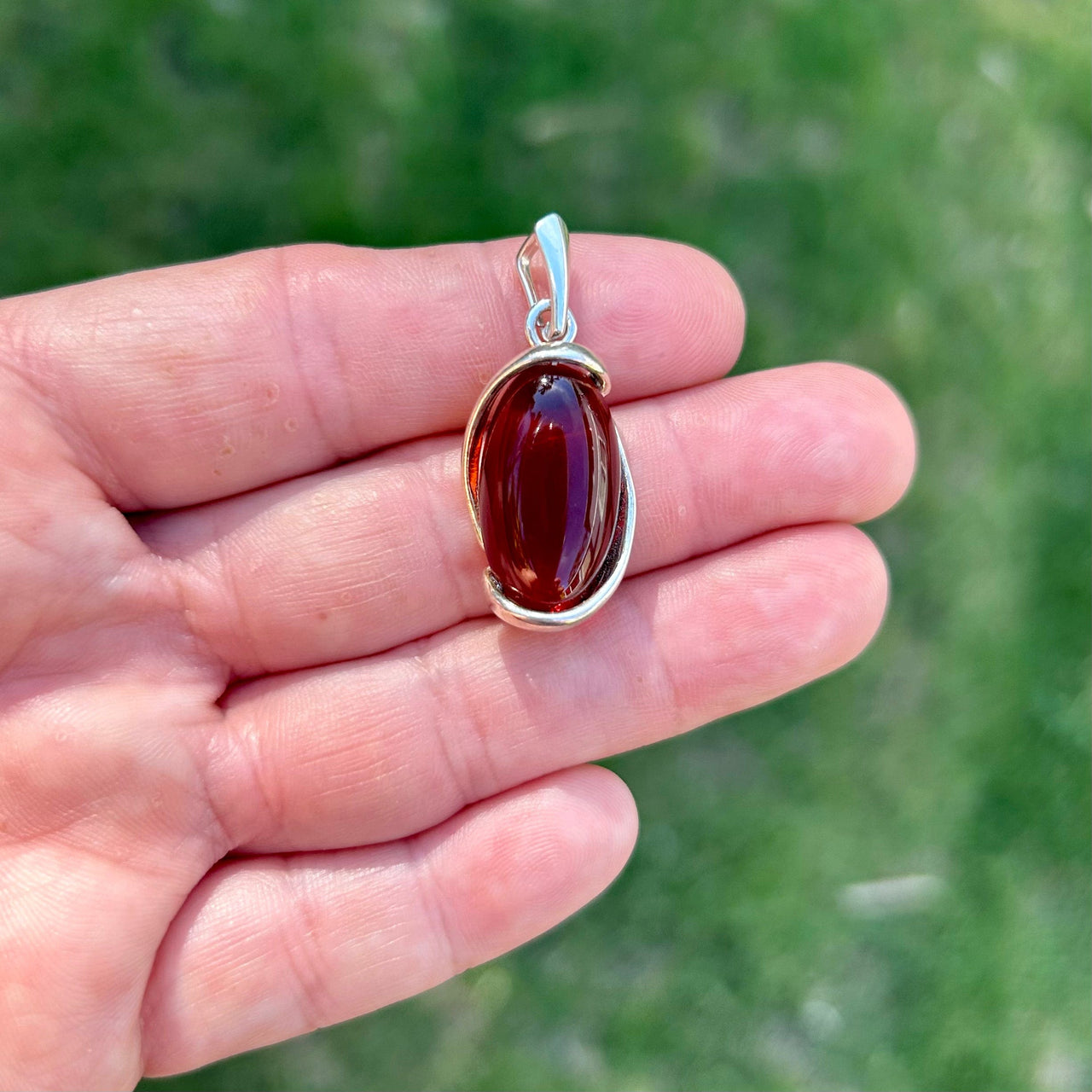 Oval Drop Baltic Amber Pendant in Sterling Silver