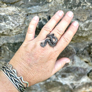 Person wearing large Octopus Tentacle Ring