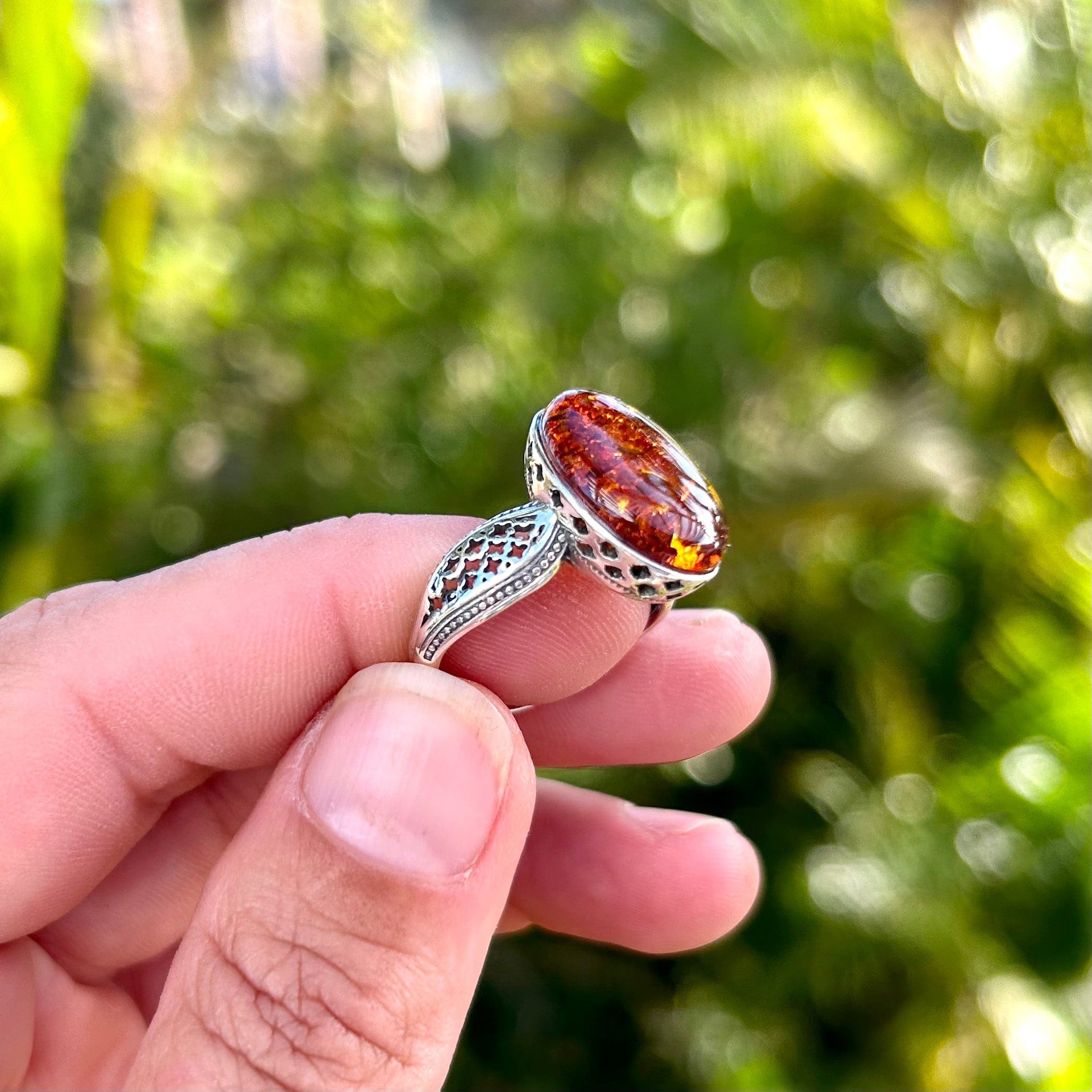 Baltic Amber Ring with Decorative Silver Cutout Details