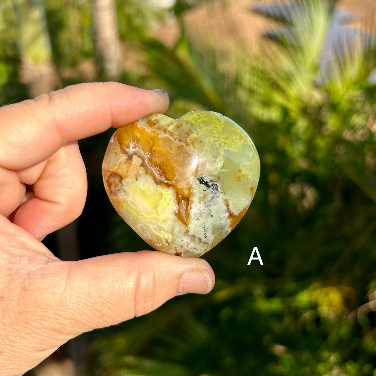 Front of A Green Opal Polished Heart