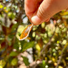 Side of Honey Baltic Amber Pendant Set in Sterling Silver