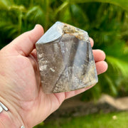 Person holding Medium Polished Smoky Quartz Crystal Point