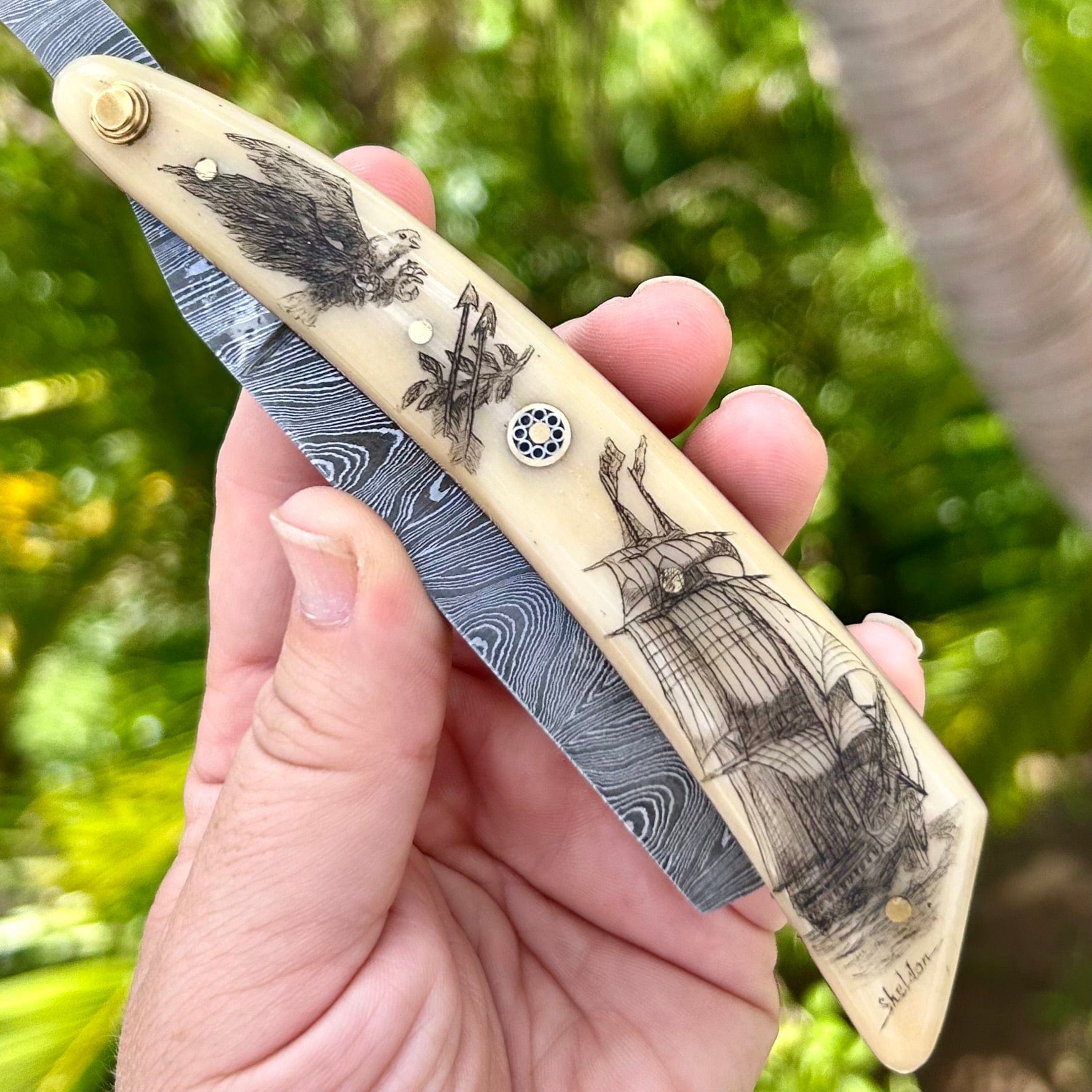 Folded High-Carbon Damascus Straight Razor with Paul Sheldon Ship Scrimshaw Art