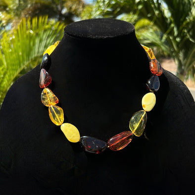 Amber necklaces. Necklace made of natural amber. Amber necklace on a  fishing line