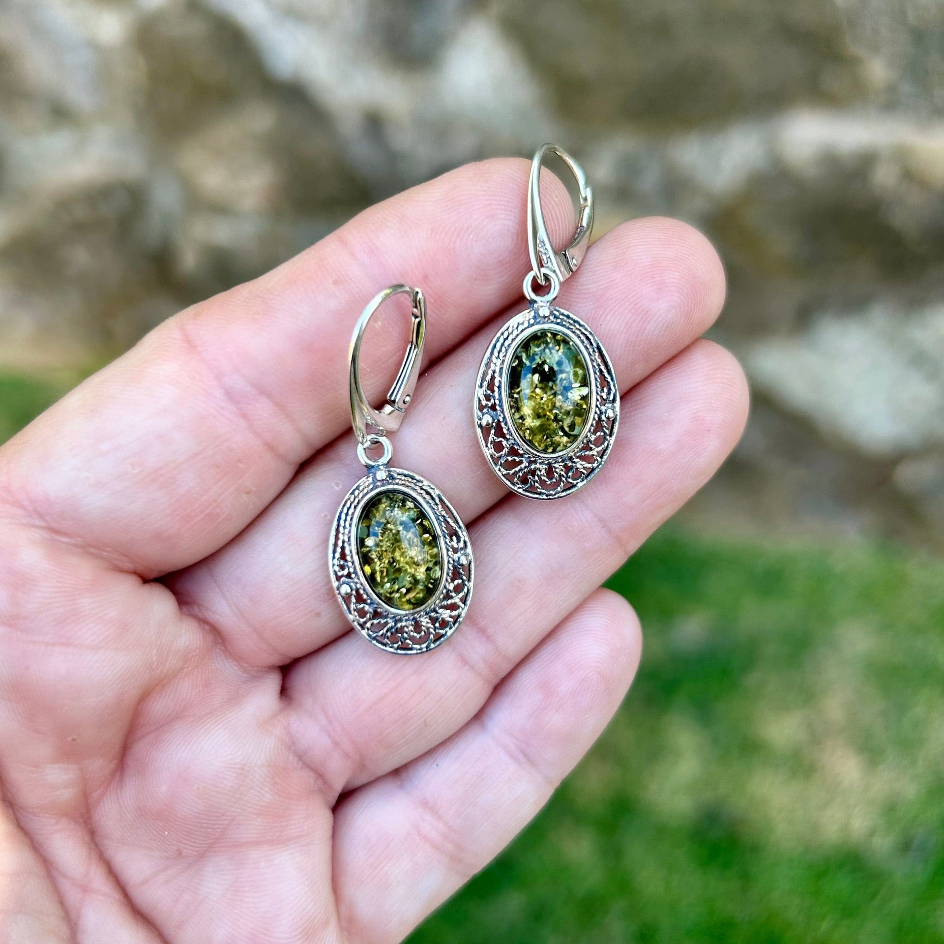 Oval Green Baltic Amber Earrings with Silver Detail