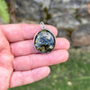 Green Baltic Amber Round Pendant in Sterling Silver