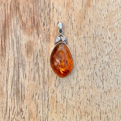 Baltic Amber Pendant with Flourish in Sterling Silver Setting