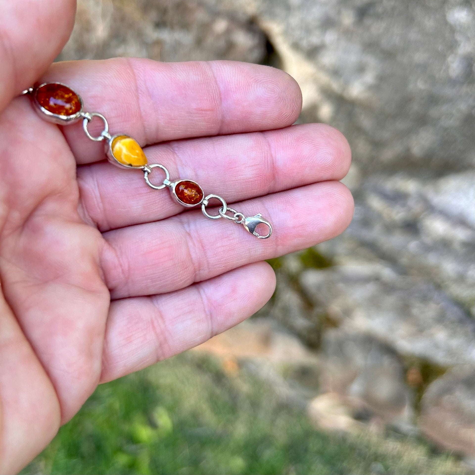 Clasp on Multi-Color Baltic Amber Sterling Silver Bracelet