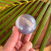 Person Holding Banded Agate Sphere
