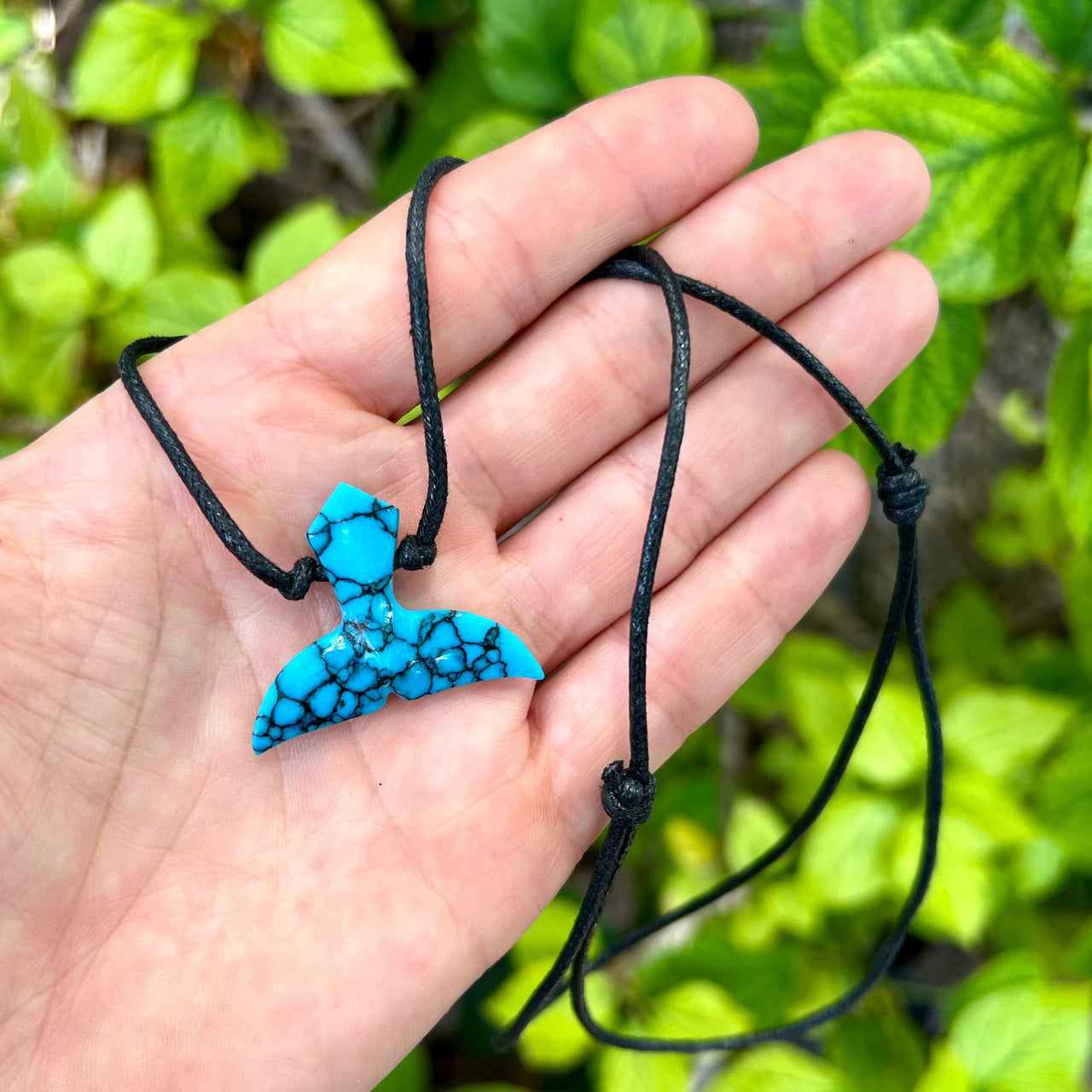 Carved Turquoise Composite with Pyrite Whale Tail- DHWT05