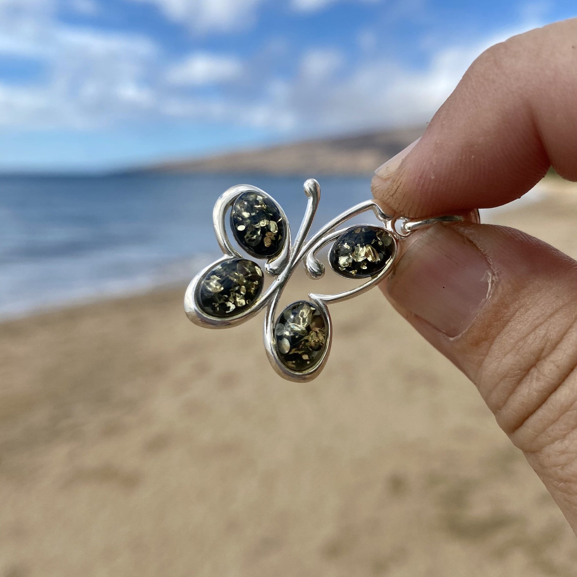 Green Baltic Amber Dancing Butterfly Pendant in Sterling Silver