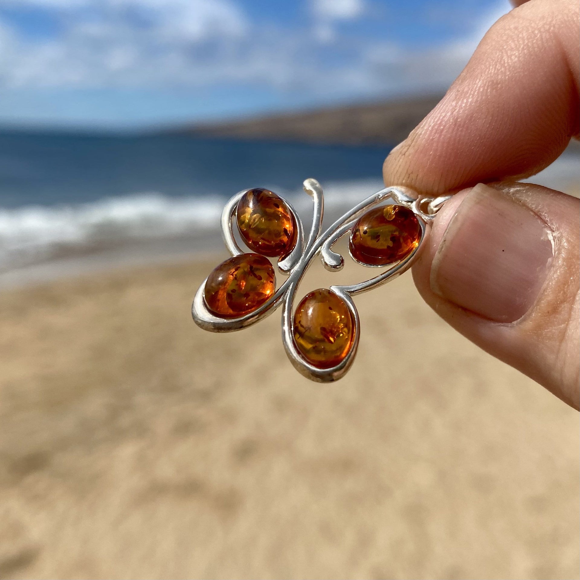 Honey Baltic Amber Dancing Butterfly Pendant in Sterling Silver