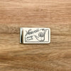 Scrimshaw Style Wide Money Clip featuring shaka hand symbol with the words hang loose and Hawaii designed by artist Linda Layden