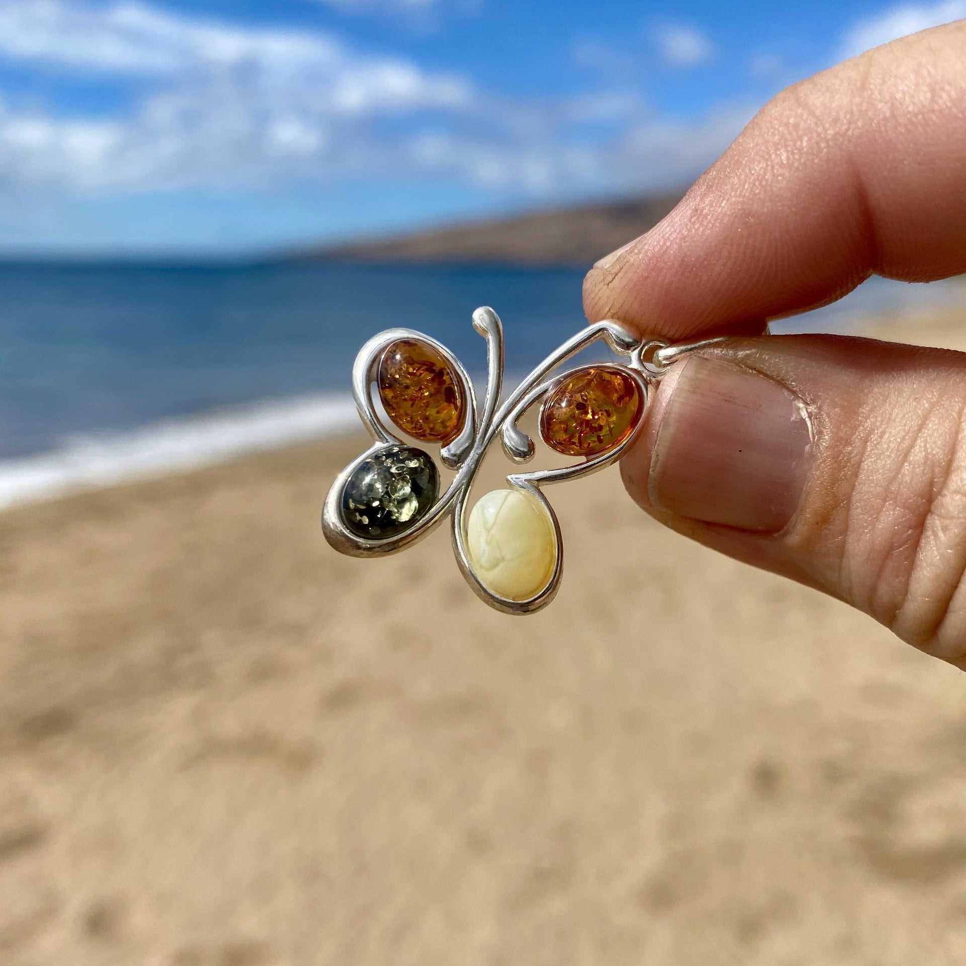 Baltic Amber Dancing Butterfly Pendant in Sterling Silver