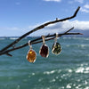Oval Baltic Amber Pendants Set in Sterling Silver
